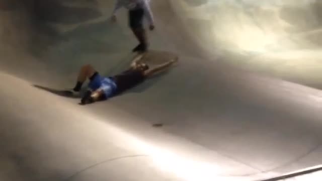 Teen brown shirt blue skatefail