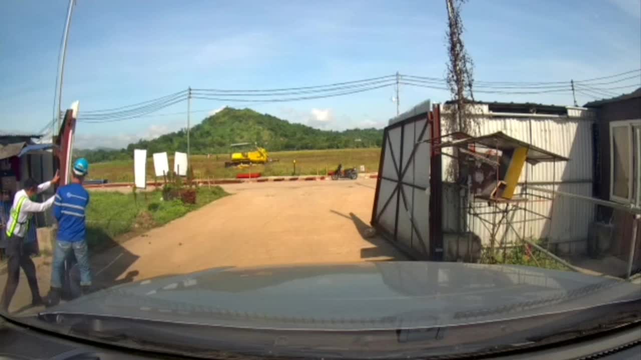 Wind Swings Gate Toward Unsuspecting Worker