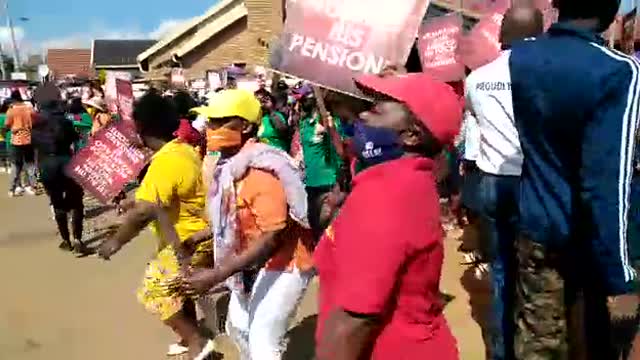 Hundreds of congregants of Unity Blessings Network gather outside the Protea Magistrates court