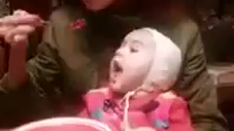 Funny baby and mother