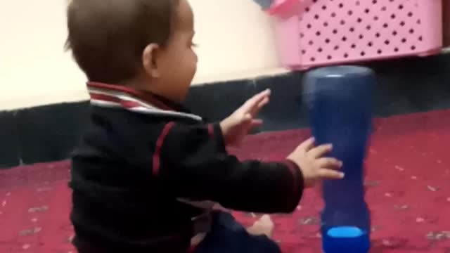 Afghan Child with a beautiful pashto Music
