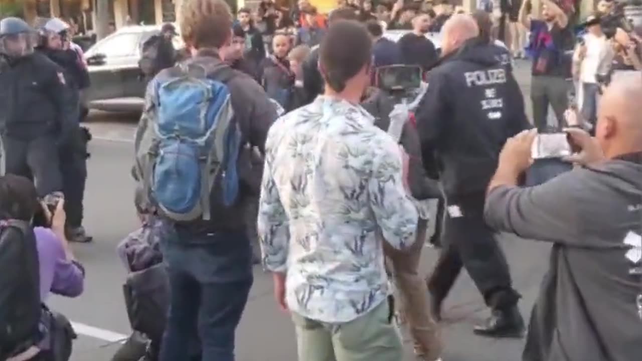 German police officers arresting an anti-Israel protester in Berlin