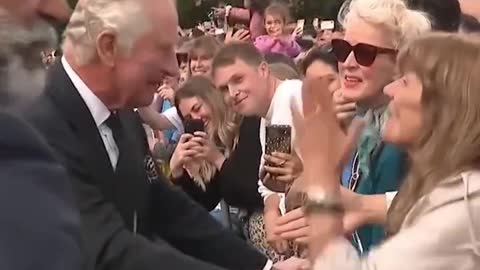 Woman Steals Kiss From England's New King