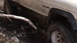 Jeep Comanche White Lightning bouncing a ledge