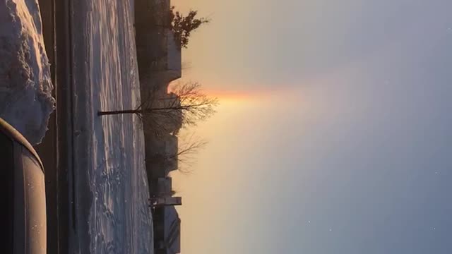 Three rainbows at sunrise