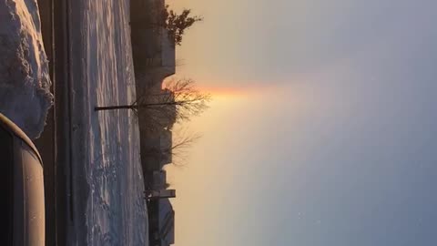 Three rainbows at sunrise