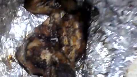 Chicken on charcoal with fine meat.