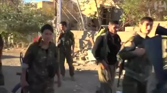 Gunfire and explosions as Kurdish forces fight for Sinjar in Iraq