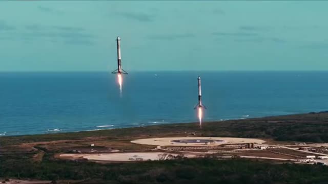 Falcon Heavy boosters landing.