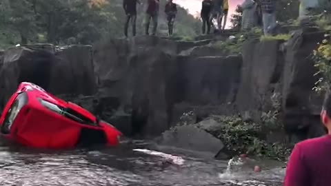 Parked car roll into the water