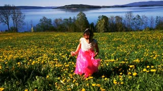 A Norwegian kid reacting when this wild grass bloom