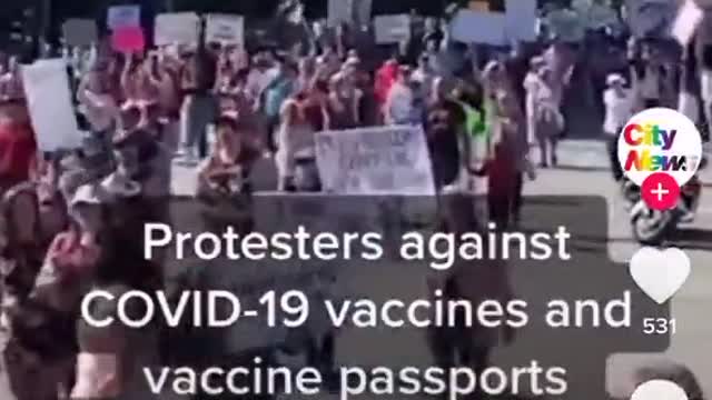 Protesters against COVID-19 vaccines and vaccine passports demonstrate in Vancouver.