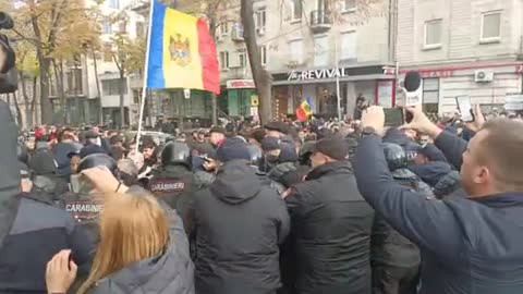 In Chisinau, police blocked the way to the Moldovan parliament building for protesters.