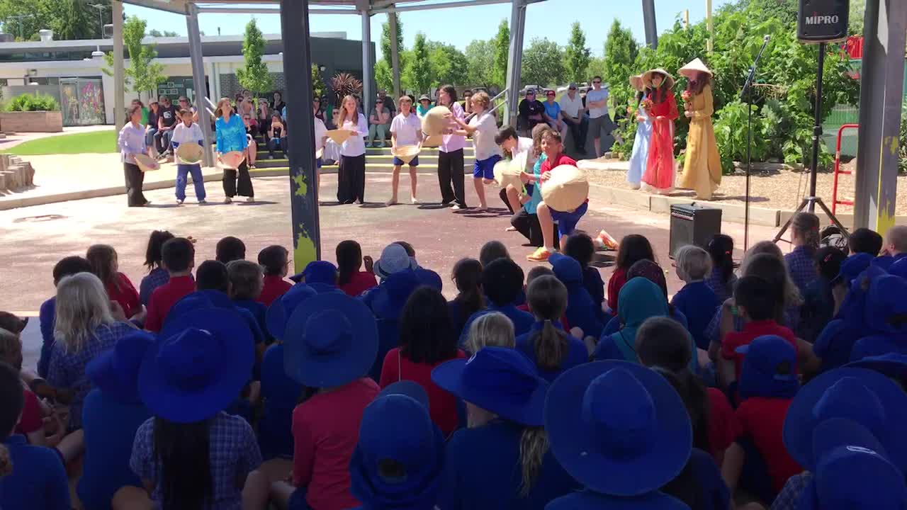 Australian year 6 pupils sing and dance a Vietnamese song