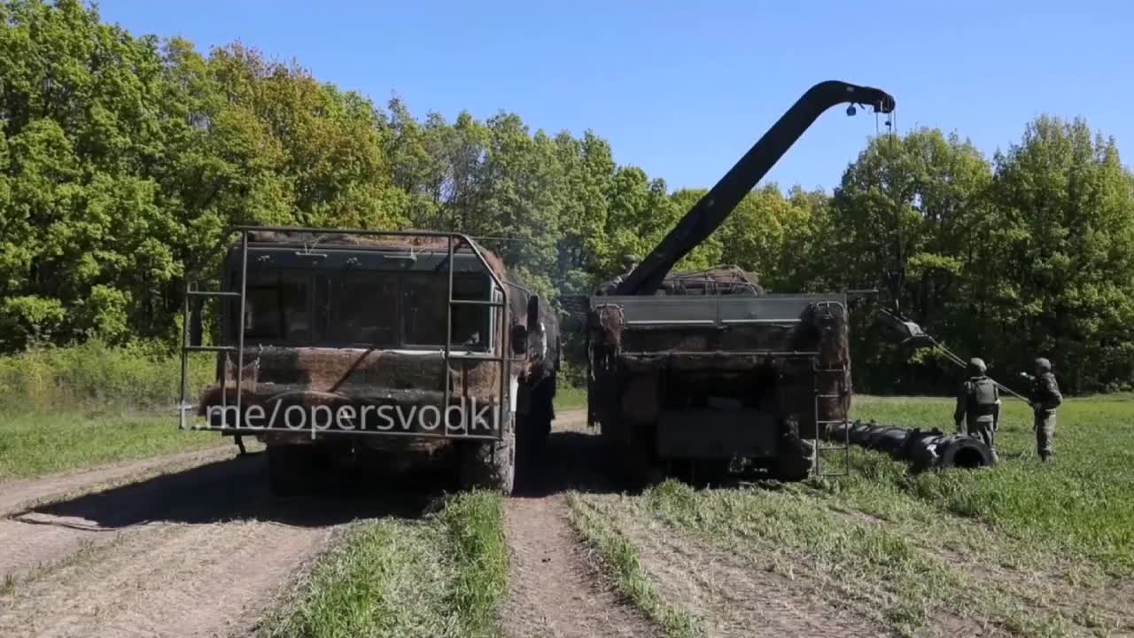 Ukraine War - Loading missiles for OTRK "Iskander" with subsequent use