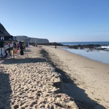 Two guys fishing in middle of competition