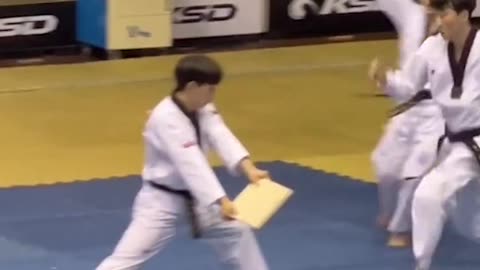 Students Mastering Taekwondo Skills with Fierce Determination! 🥋