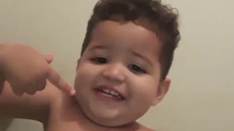 baby is funny when he is filmed