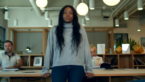 A Pretty Cool Time Lapse Video of a Woman Leaning on a Table