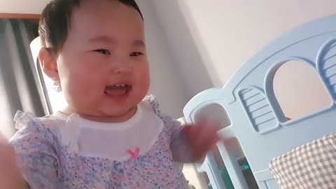 crying and laughing baby