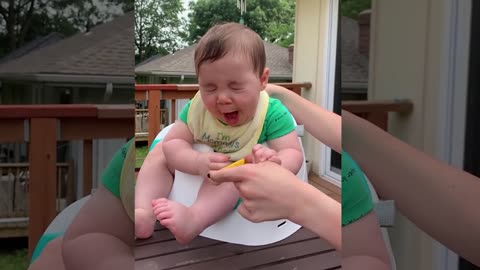funny baby videos first time eat lemon