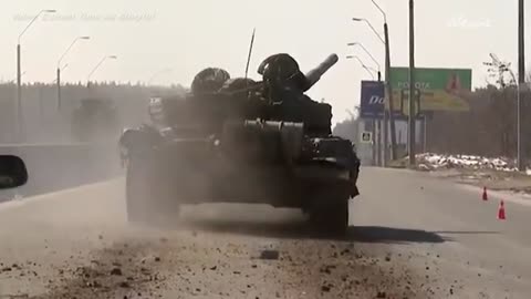 Russian tank convoy near Kyiv retreats under fire