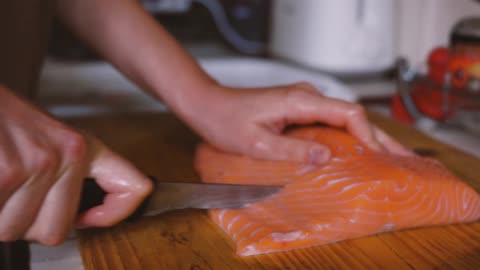 Best Person Slicing the Salmon