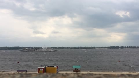 The steamer floats in slow motion mode in high gusty weather