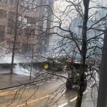 Belgian farmers see no end as police barricades are ripped down in Brussels.
