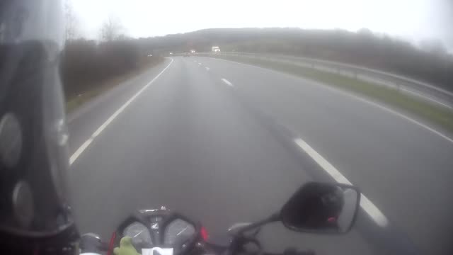 Car Overtaking Motorbike in Same Lane