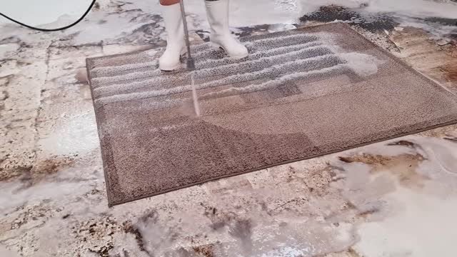 Washing a very dirty carpet with geometric patterns Speeded Up