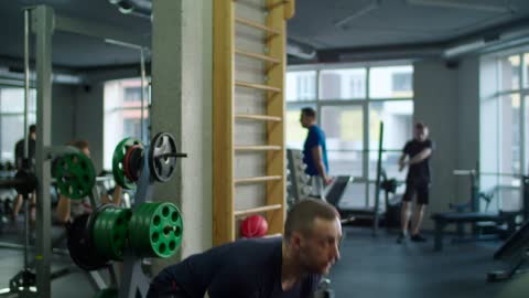 Man exercising with kettlebell