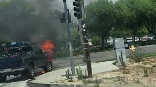 Man Not Worried as He Walks Past Raging Car Fire