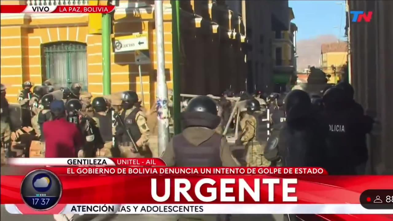 Bolivian soldiers are placing barricades to block the roads into Plaza Murillo.
