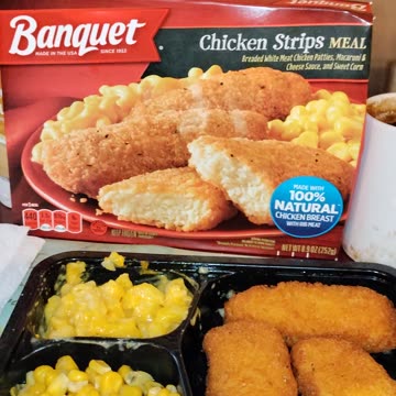 Eating Banquet Chicken Strips Meal, Dbn, MI, 8/17/23
