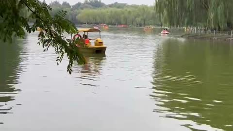 Playing on the lake in a boat