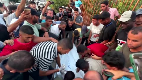 Palestinians mourn dead after Israeli strike on Gaza's Al-Mawasi