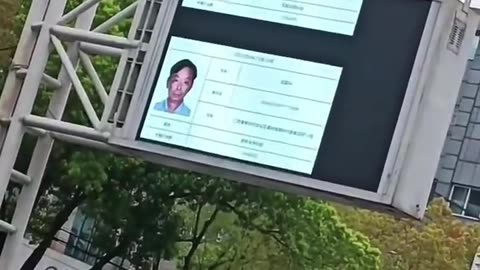 China citizens, on the blacklist of Social Credit System, displays their faces on billboards