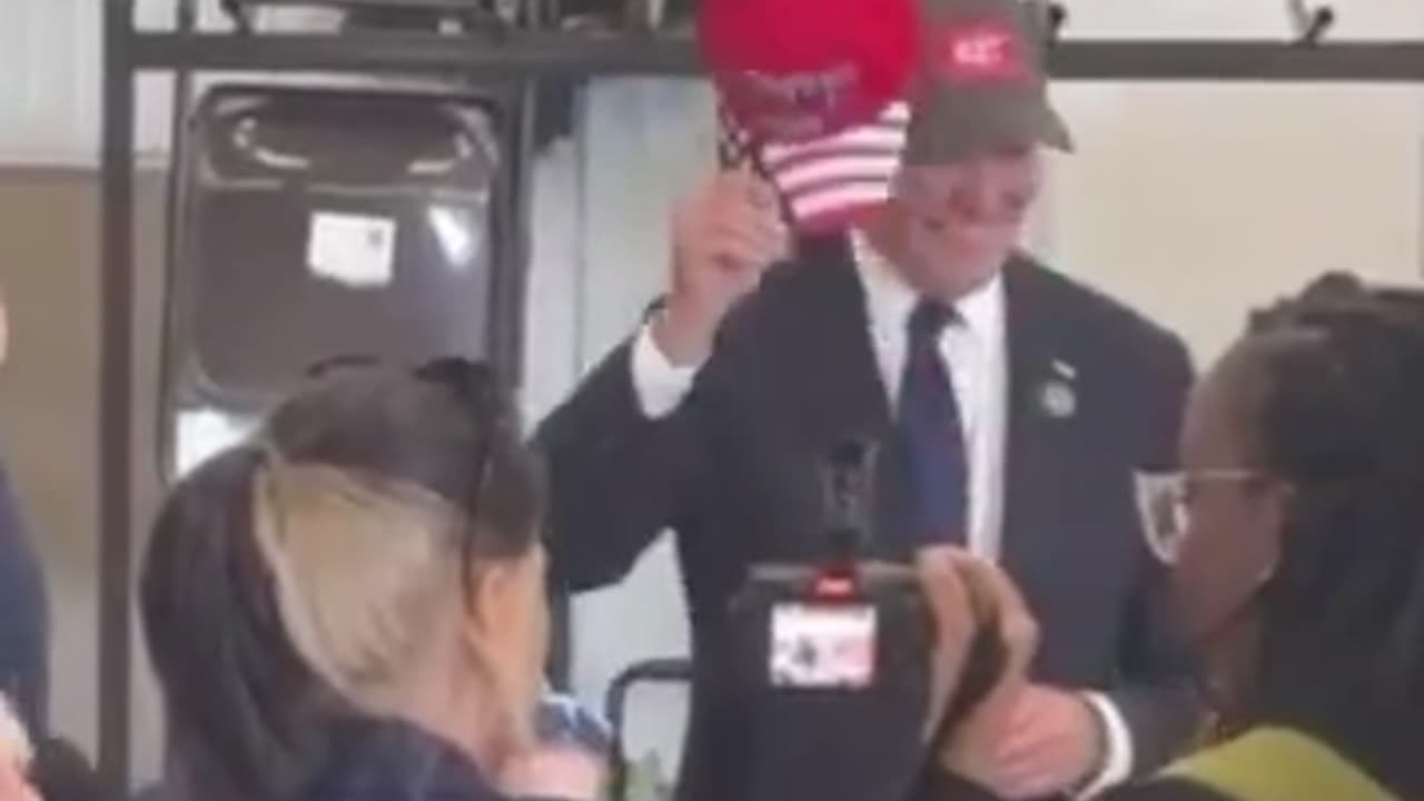 Biden puts on a Trump 2024 hat😂