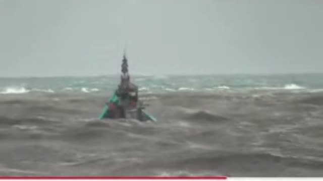 SMALL BOAT IN STORM