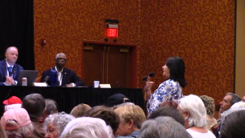Footage of the ARGOP State Convention Julie Harris smiles during credentialing confusion