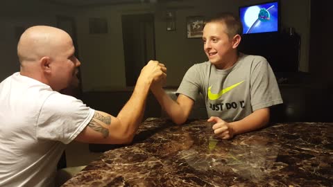 Boy Hits Himself in the Face Arm Wrestling