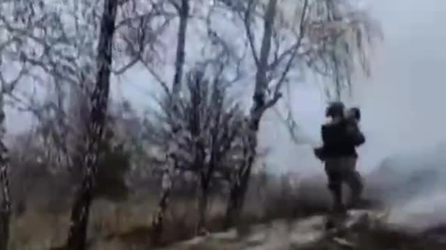 Ukrainian soldiers at the Kiev reservoir firing from Igla MANPADS at Russian helicopters