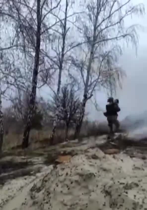Ukrainian soldiers at the Kiev reservoir firing from Igla MANPADS at Russian helicopters