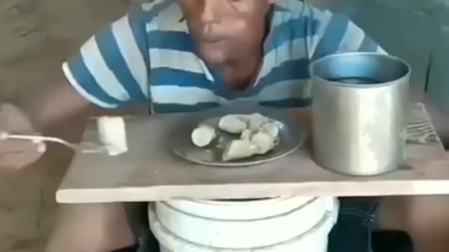 The dog jumps on the man while eating🤣🤣😂😂😂😂🤣🤣🤣