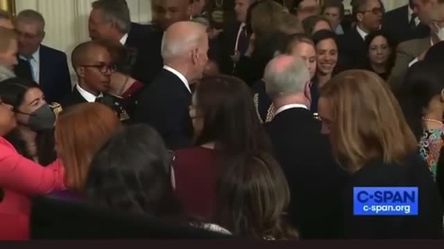 Obama walks RIGHT by Biden