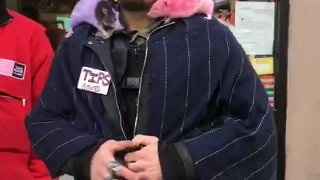 7-eleven guy has rats on either shoulder