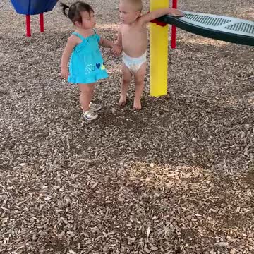 Baby boy sweet to the little girl