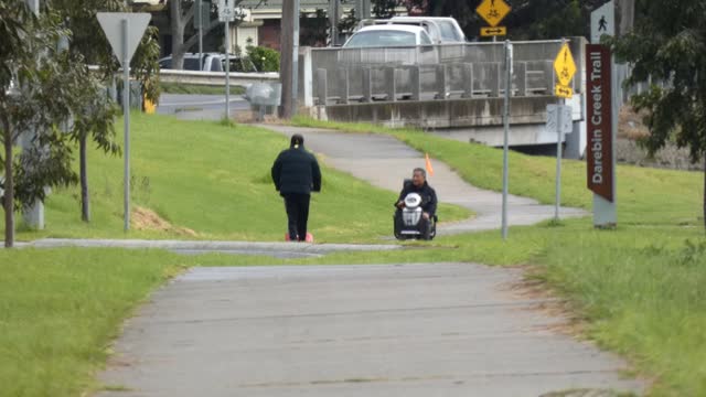 Scooter flying by Mill Park Melbourne Australia