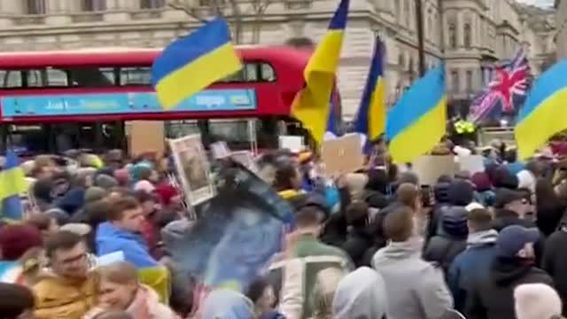 "Stand with Ukraine!" some protesters chanted. "Sanctions now!" said others.